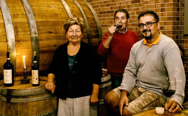 The Mainerdo family in the wine cellar at Mainerdo Wines in Italy