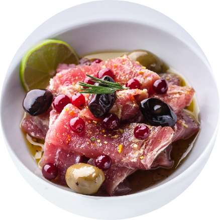 Tuna with olives, lime and herbs
