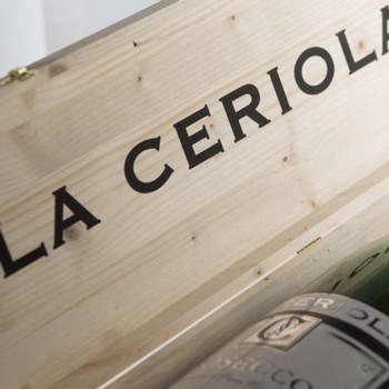 a bottle of La Ceriola wine in a wooden box
